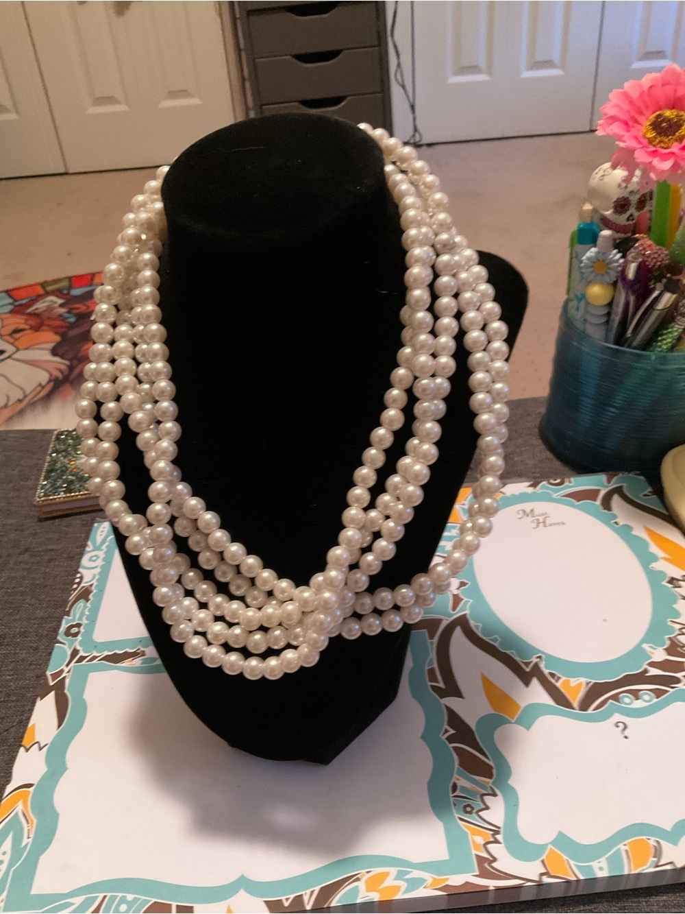 Classic Multi-Strand faux Pearl Necklace, individual strands on elastic cord.
